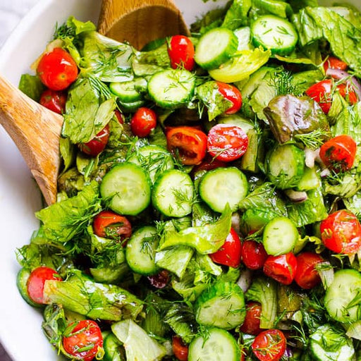 Christmas Green leaves, heirloom tomatoes, cucumber, avocado, feta and lemon vinaigrette - serves 4 people